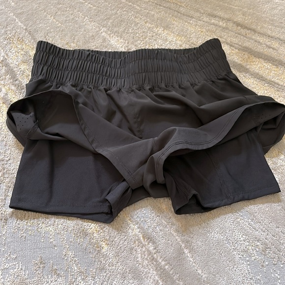 2 pairs of black Asics 2 in 1 Shorts, brand new condition. - Picture 6 of 6